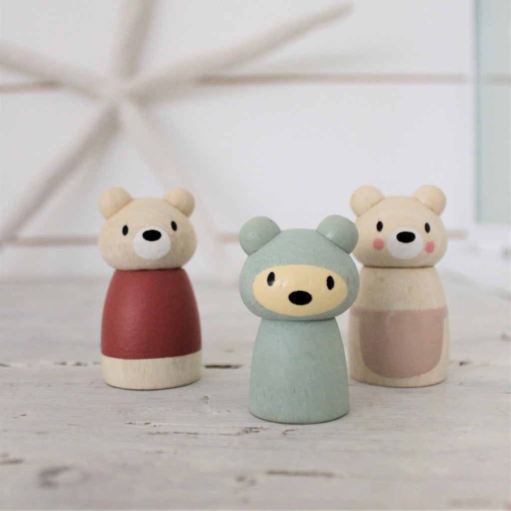 Tenderleaf solid wood bear cub doll family that are completely plastic free, with mummy daddy and baby all with their character names printed underneath. Open ended play and dolls world accessories and a perfect gift idea for children.