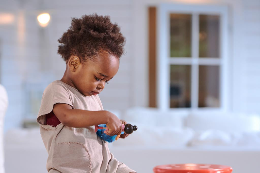 A child enjoying play-based learning