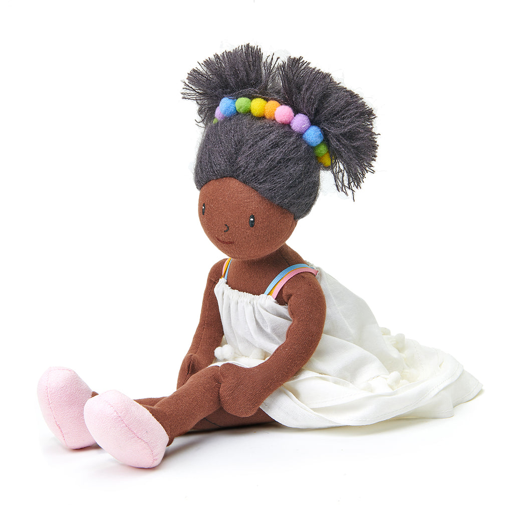 plastic-free rag soft doll with rainbow hair band and white dress