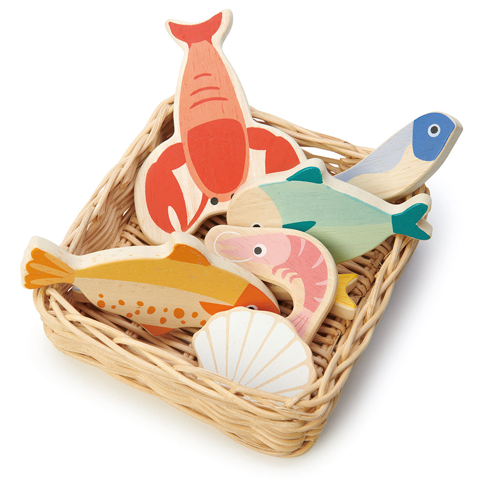 A hand crafted wicker basket with plastic free wooden lobster, plaice, mackerel, herring, whitebait, prawn and scallop.  Part of our Market day Range and an accessory to our gorgeous Farmers Market.