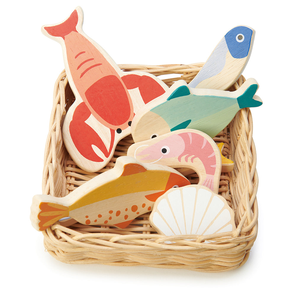 A hand crafted wicker basket with plastic free wooden lobster, plaice, mackerel, herring, whitebait, prawn and scallop.  Part of our Market day Range and an accessory to our gorgeous Farmers Market.