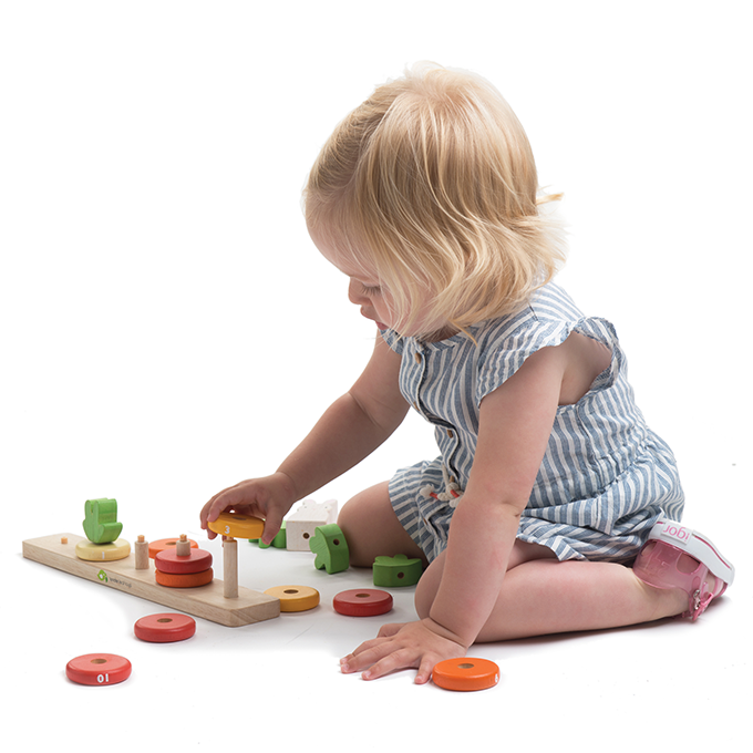 Tender Leaf Toys wooden counting game to educate toddlers. 10 numbered stacking rings designed for child development and learning through play