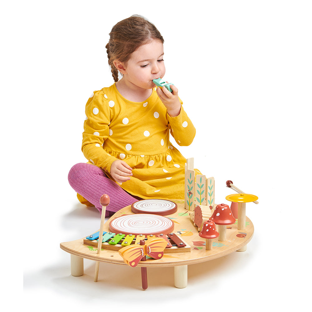 Tenderleaf wooden music tray table for children with drums bells and lots of accessories. Woodland rainbow theme