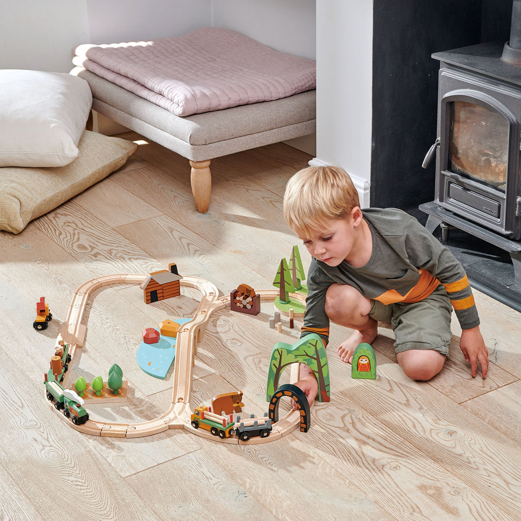 Tender Leaf Toys wooden train set with 30 track pieces and lots of accessories