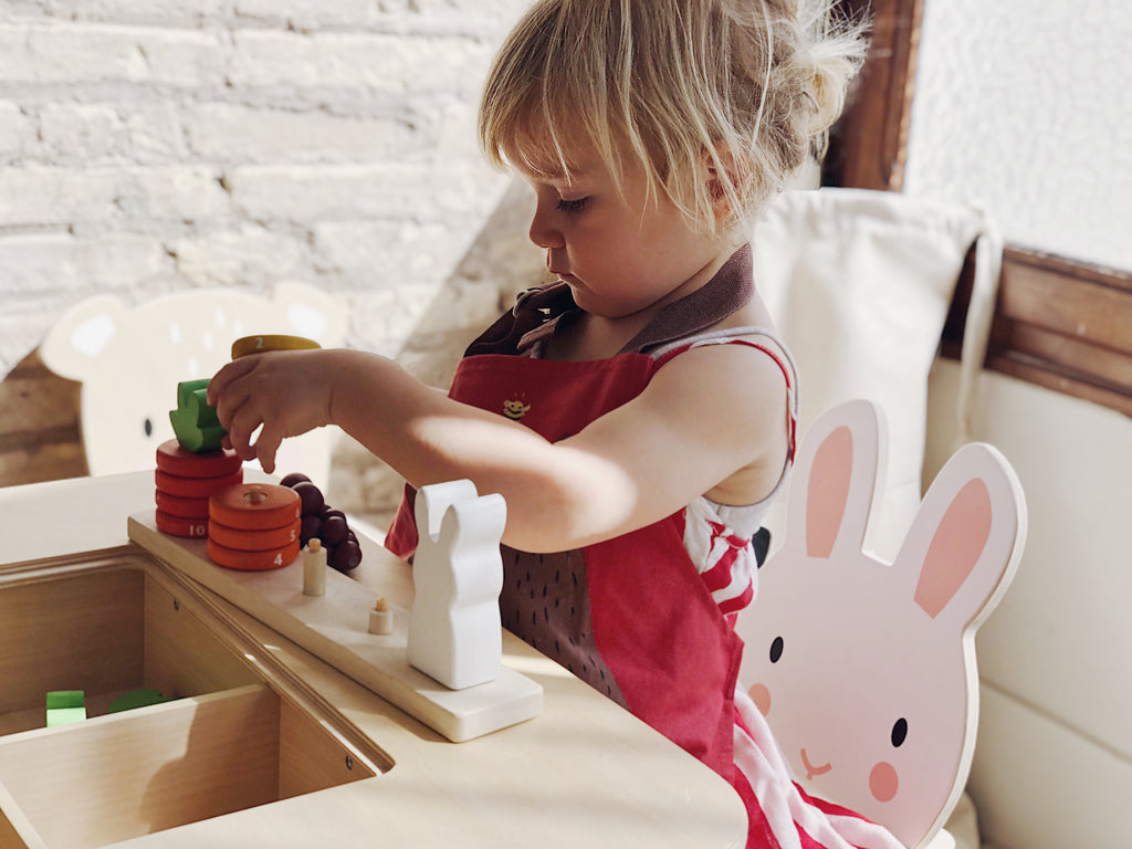 Tender Leaf Toys wooden counting game to educate toddlers. 10 numbered stacking rings designed for child development and learning through play